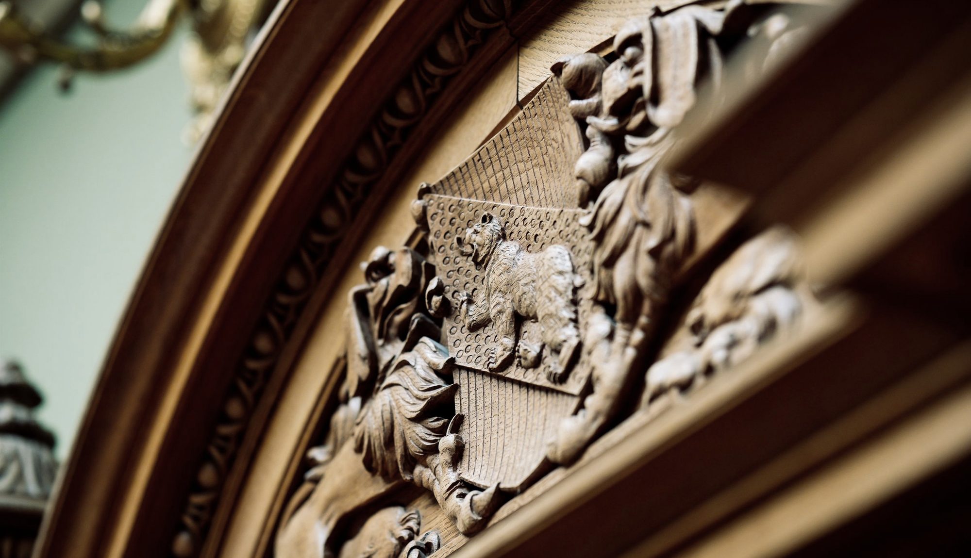 Close detail of carved timber, showing grain and surface