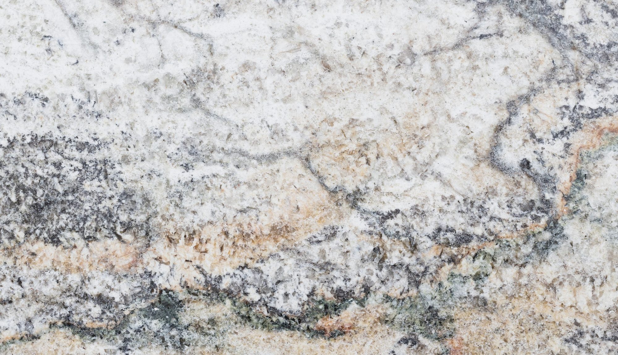 Marble surface showing natural patterning and tonal variation across the stone